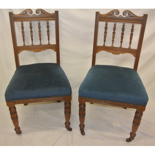 301 - Pair of Edwardian occasional chairs with shaped railed backs, upholstered seats, turned legs with ca... 