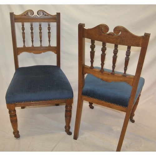 301 - Pair of Edwardian occasional chairs with shaped railed backs, upholstered seats, turned legs with ca... 