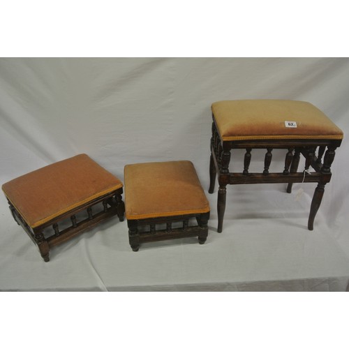 62 - Set of three oblong upholstered foot stools with turned rails & shaped legs