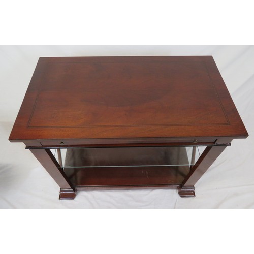 66 - Edwardian mahogany side or hall table with frieze drawer, glass shelving, on bracket feet