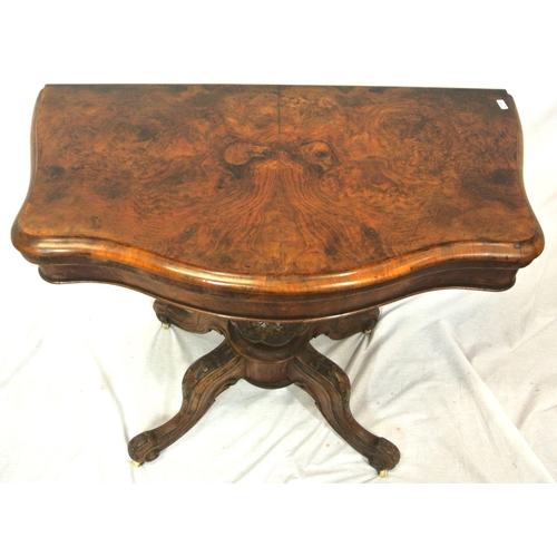 210 - Victorian walnut card table with serpentine shaped sides, swivel fold-over top, with press under, on... 