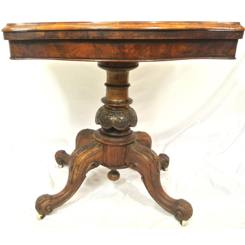 210 - Victorian walnut card table with serpentine shaped sides, swivel fold-over top, with press under, on... 