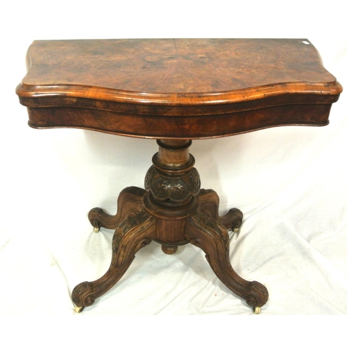 210 - Victorian walnut card table with serpentine shaped sides, swivel fold-over top, with press under, on... 