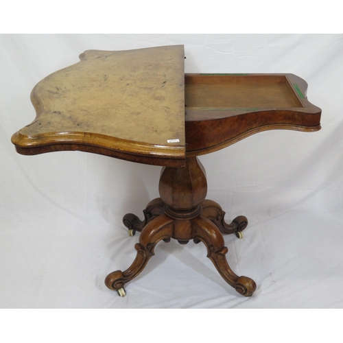 220 - Victorian walnut card table with serpentine shaped sides, swivel fold-over top, hexagonal baluster c... 