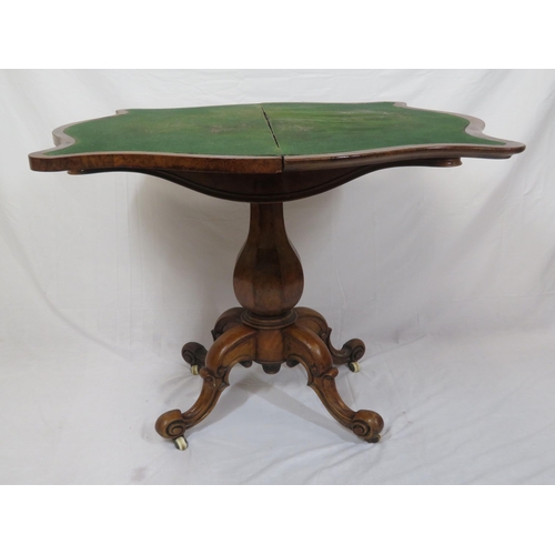 220 - Victorian walnut card table with serpentine shaped sides, swivel fold-over top, hexagonal baluster c... 