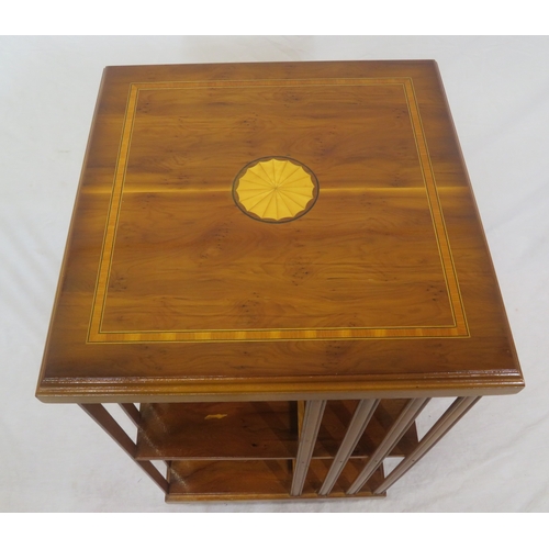 104 - Edwardian style inlaid & crossbanded mahogany revolving bookcase with railed sides, shell inlay, on ... 