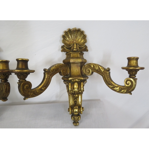 112 - Pair of French style carved sconces with scroll & shell decoration