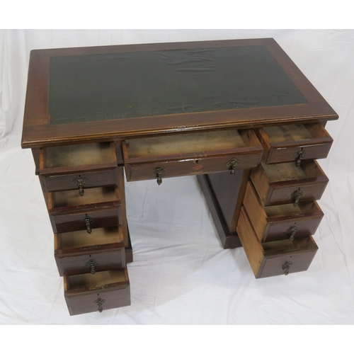 120 - Edwardian style pedestal desk with two frieze drawers, six side drawers, teardrop handles, plinths