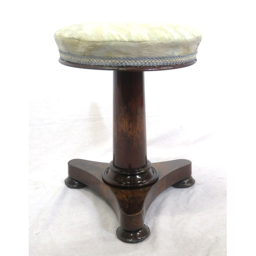 121 - William IV walnut dressing stool with round upholstered adjustable top, turned tapering column, on c... 