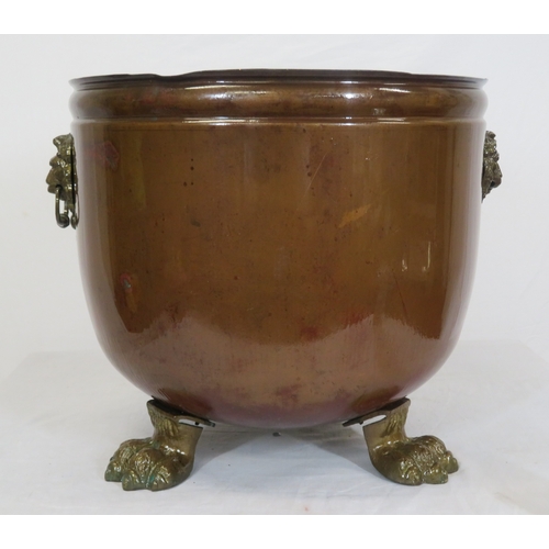 127 - Georgian style copper cauldron with lionmask handles & lionclaw feet