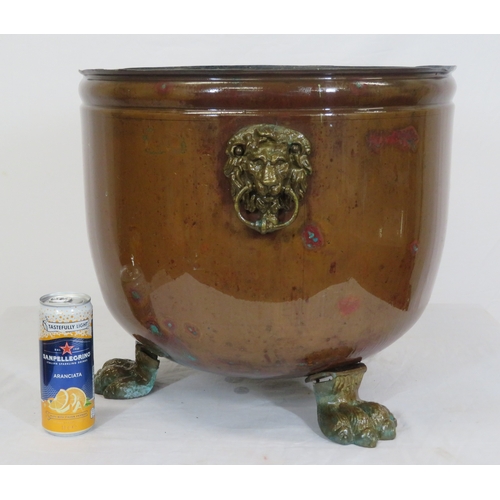 127 - Georgian style copper cauldron with lionmask handles & lionclaw feet