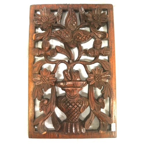 132 - Oriental style carved timber panel with vase & foliate decoration