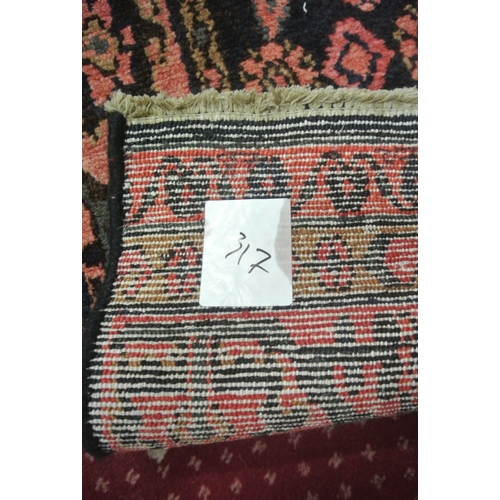 137 - Deep ground Iranian runner with all over pattern with hints of pink and surrounding border 295 X 85 ... 