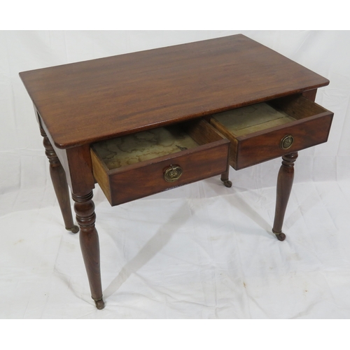 156 - Victorian mahogany hall or side table with two frieze drawers, drop handles, on turned tapering legs... 