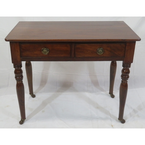 156 - Victorian mahogany hall or side table with two frieze drawers, drop handles, on turned tapering legs... 