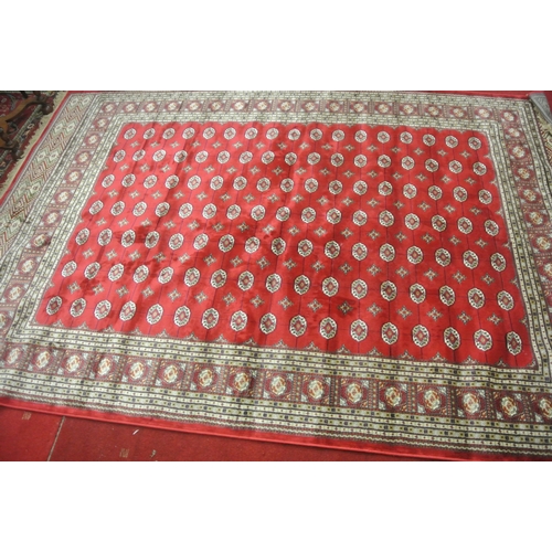 169 - Red ground full pile Kashmir carpet with all over Bukhari design 300x200cm