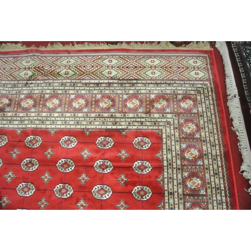 169 - Red ground full pile Kashmir carpet with all over Bukhari design 300x200cm