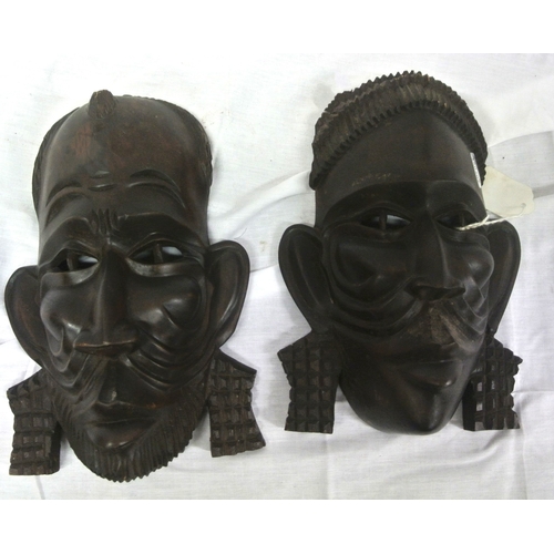 183 - Pair of African tribal art carved face masks