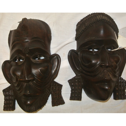 183 - Pair of African tribal art carved face masks