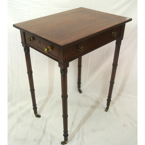 196 - Victorian mahogany hall or side table with side drawer, brass handles, turned tapering legs with cas... 