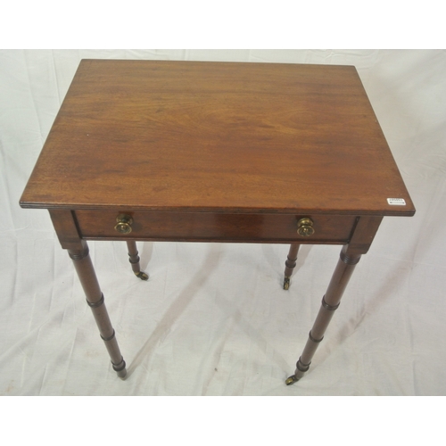 196 - Victorian mahogany hall or side table with side drawer, brass handles, turned tapering legs with cas... 