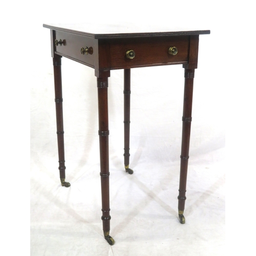 196 - Victorian mahogany hall or side table with side drawer, brass handles, turned tapering legs with cas... 