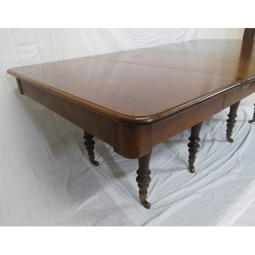 250 - Victorian mahogany two section economy dining table with two extra leaves, with rounded corners, on ... 