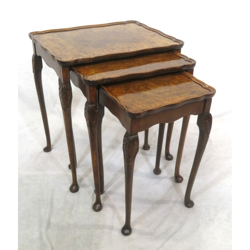 254 - Victorian style walnut nest of three tables with raised wavy borders & cabriole legs with pad feet