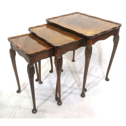 254 - Victorian style walnut nest of three tables with raised wavy borders & cabriole legs with pad feet