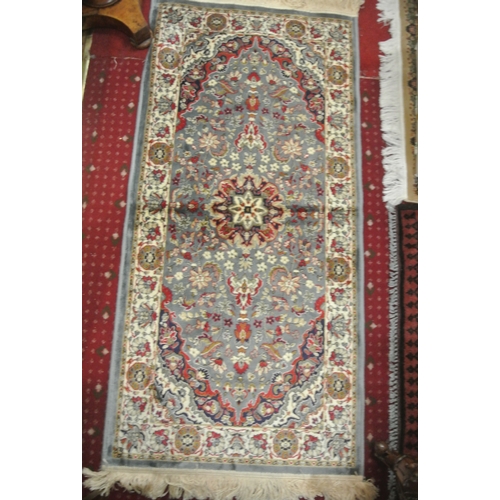 276 - Pair of duck egg ground full pile Kashmir rugs of floral all over design