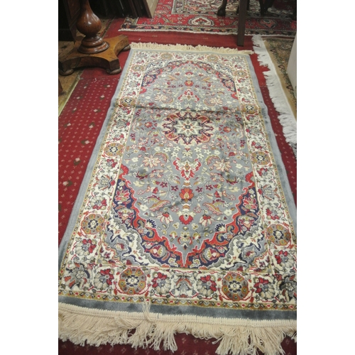 276 - Pair of duck egg ground full pile Kashmir rugs of floral all over design