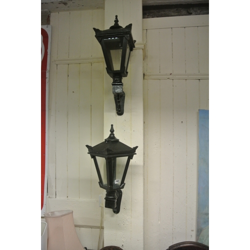 284 - Pair of cast iron garden lamp holders with angled sides