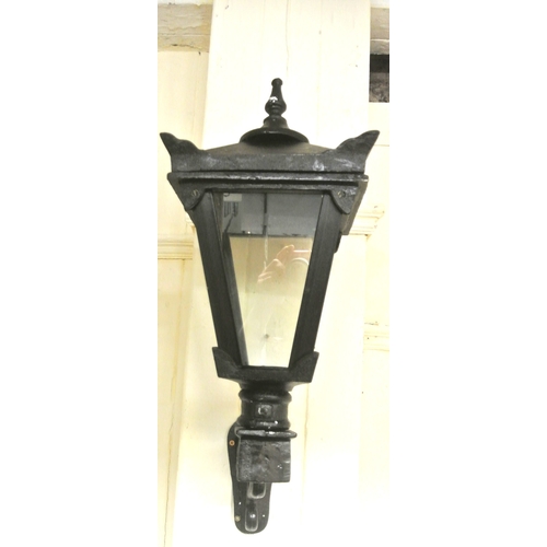 284 - Pair of cast iron garden lamp holders with angled sides