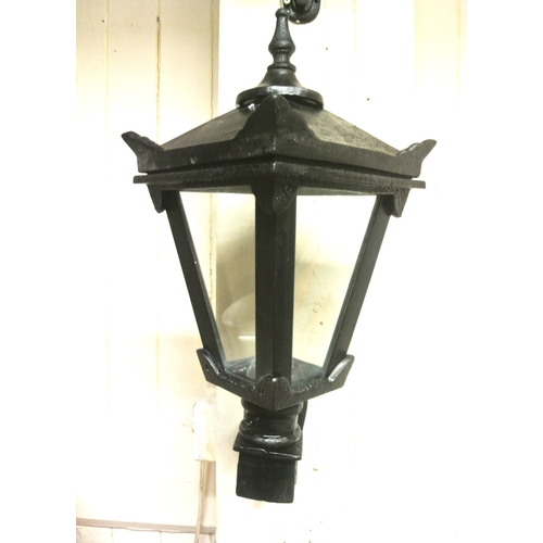 284 - Pair of cast iron garden lamp holders with angled sides