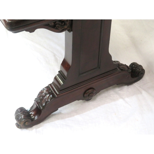 290 - Victorian mahogany three tier dumbwaiter with railed back, foliate carving, on scroll feet