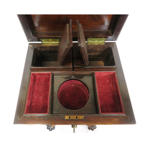 300 - William IV rosewood teapoy with sarcophagus shaped top, fitted & lined interior, raised on ornate fo... 