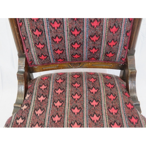 319 - Victorian mahogany ladies chair with pierced carved decoration, foliate upholstery, on turned legs