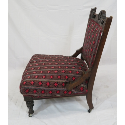 319 - Victorian mahogany ladies chair with pierced carved decoration, foliate upholstery, on turned legs