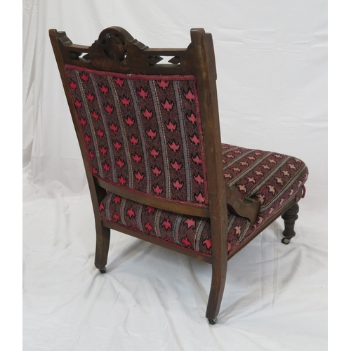 319 - Victorian mahogany ladies chair with pierced carved decoration, foliate upholstery, on turned legs