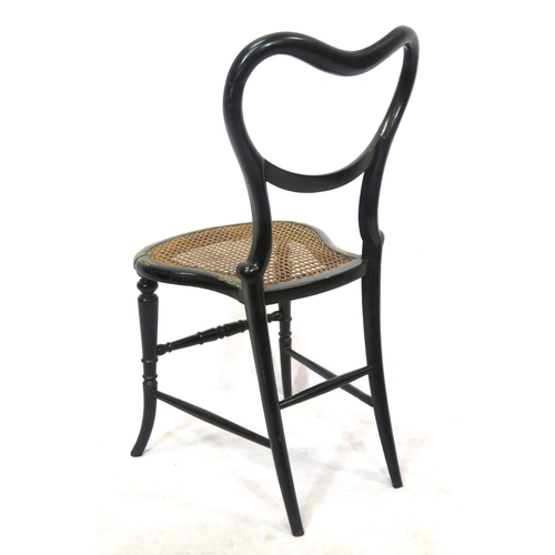 323 - Oriental style ebonised occasional chair with ornate bird & foliate decoration, cane seat, shaped le... 