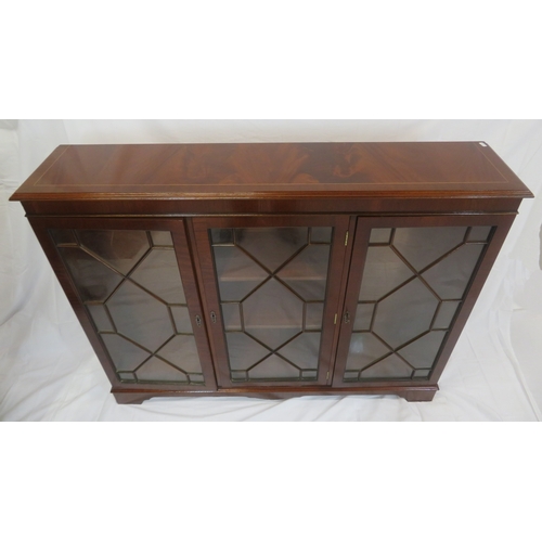 65 - Edwardian style mahogany bookcase with astragal glazed doors, adjustable shelving, on bracket feet