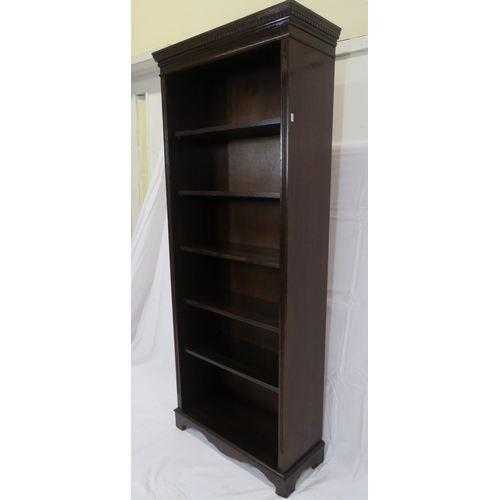 70 - Edwardian style tall bookcase with dentil frieze, adjustable shelving, on bracket feet