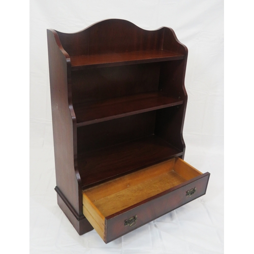 84 - Edwardian style waterfall bookcase with adjustable shelving, drawer with drop handle, on bracket fee... 