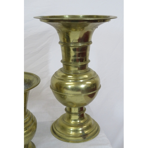 88 - Four brass vases, stand, etc