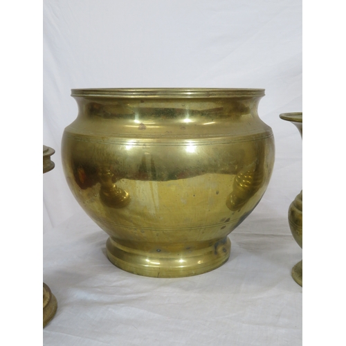 88 - Four brass vases, stand, etc