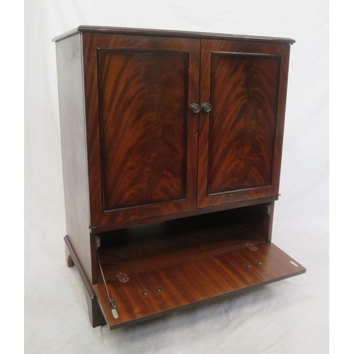 90 - Edwardian style mahogany press or TV cabinet with panelled doors, drawer under with drop handles, on... 