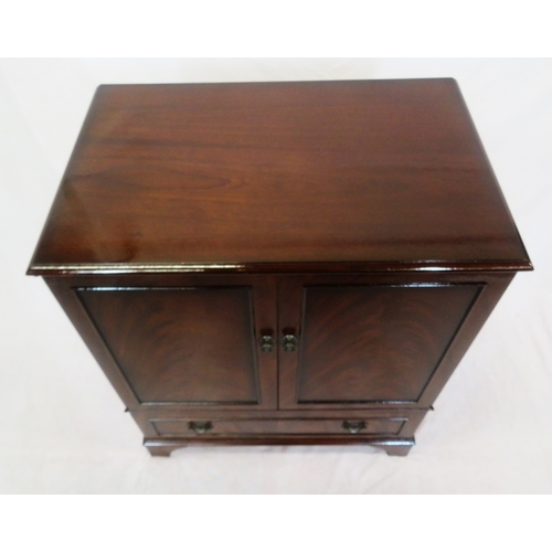 90 - Edwardian style mahogany press or TV cabinet with panelled doors, drawer under with drop handles, on... 