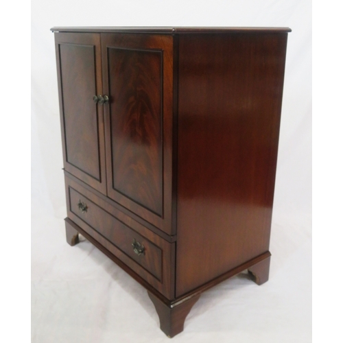 90 - Edwardian style mahogany press or TV cabinet with panelled doors, drawer under with drop handles, on... 