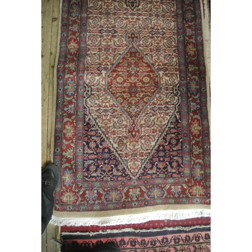 92 - Cream ground fine hand woven Persian runner with multi coloured field with diamond medallion design ... 