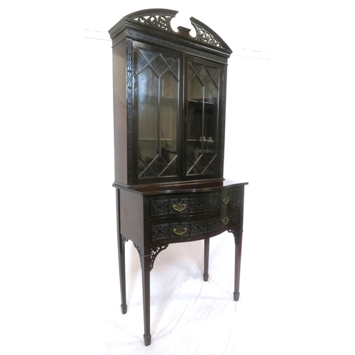 95 - Edwardian mahogany bookcase with domed pierced pediment, astragal glazed doors with shelved interior... 